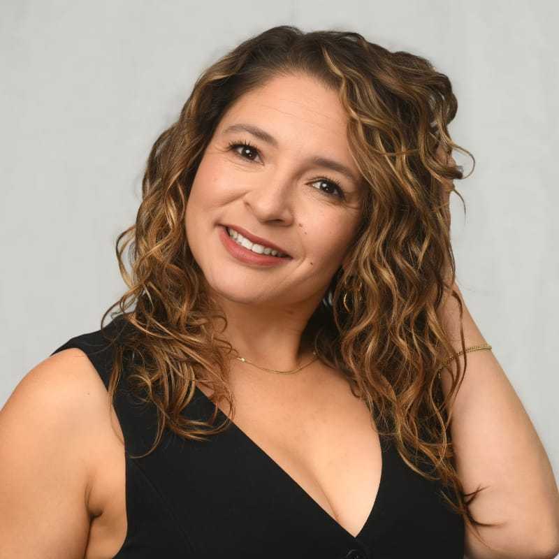 Portrait of Adriana Hernandez, a professional stylist at Michael Anthony Salon, showcasing their expertise and style.