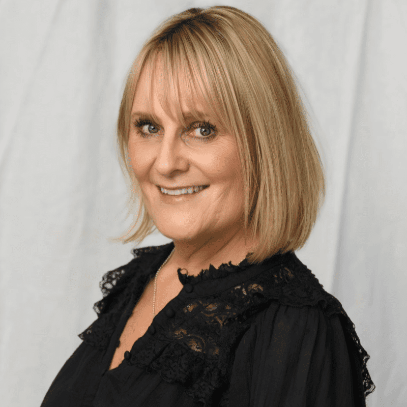 Portrait of Michelle Demeny, a professional stylist at Michael Anthony Salon, showcasing their expertise and style.